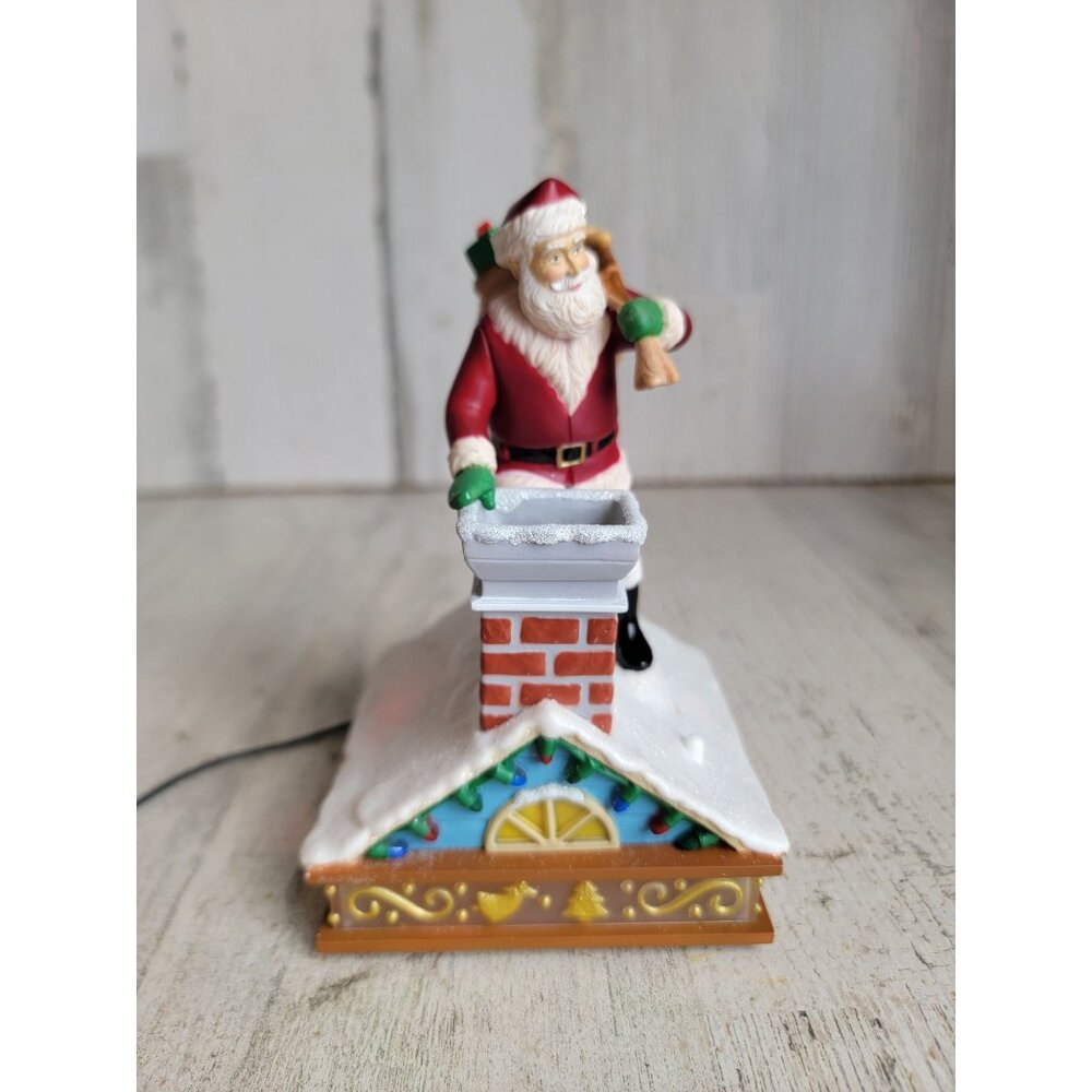 Hallmark Up on the house top magic ornament Xmas Santa Claus